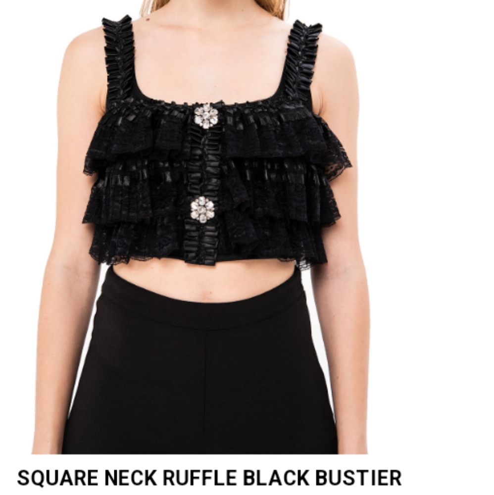 1. Kiki Riki black ruffle top 2. Moschino crop top